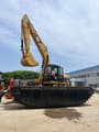Excavadora anfibia Caterpillar 320CL 2020, vista lateral