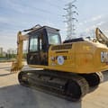 2021 Caterpillar 315D2 crawler excavator, rear three-quarter view