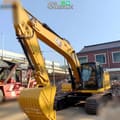 2021 Caterpillar 320 crawler excavator, front three-quarter view