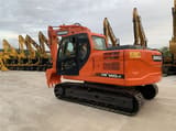 2021 Doosan DX140LC crawler excavator, rear three-quarter view