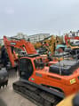 2021 Doosan DX300LC-9C crawler excavator, rear three-quarter view