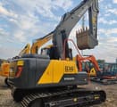 2021 Volvo EC140 crawler excavator, rear three-quarter view