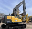 2021 Volvo EC140DL crawler excavator, rear three-quarter view