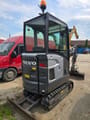 2021 Volvo EC18E mini excavator, rear three-quarter view