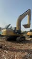 2022 Caterpillar 336D crawler excavator, rear three-quarter view