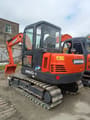 2022 Doosan DH60-7 mini excavator, rear three-quarter view