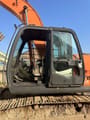 2022 Hitachi ZX210-3 excavator cab side view
