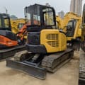 2022 Komatsu PC-55MR mini excavator rear three-quarter view