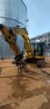 2022 Komatsu PC88MR-11EO mini excavator, side view with fork attachment