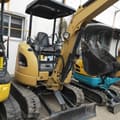 2023 Caterpillar 302CR mini excavator, front three-quarter view