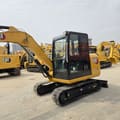 2023 Caterpillar 305.5E mini excavator, three-quarter view