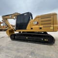 2023 Caterpillar 320 excavator, side profile view
