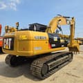 2023 Caterpillar 323D2L crawler excavator, rear three-quarter view