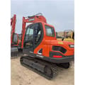 2023 Doosan DX80 mini excavator, rear three-quarter view