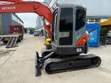 2023 Hitachi Zaxis 55 mini excavator, rear three-quarter view