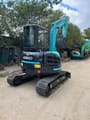 2023 Kobelco SK55SR mini excavator, rear three-quarter view