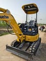 2023 Komatsu 20MR mini excavator, rear three-quarter view