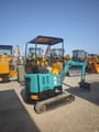 2023 Komatsu PC18 mini excavator, rear three-quarter view