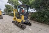 2023 Komatsu PC35 mini excavator, rear three-quarter view