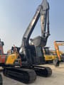 2023 Volvo EC140 crawler excavator, front three-quarter view