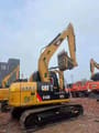 2024 Caterpillar 312D mini excavator, rear three-quarter view