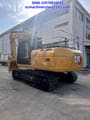 2024 Caterpillar 320GX crawler excavator, rear three-quarter view
