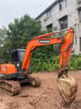 2024 Doosan DH60-7 mini excavator, side profile view