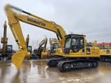 2024 Komatsu PC220 crawler excavator, side view