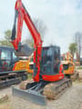 2024 Kubota U48-4 mini excavator, front three-quarter view