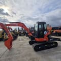 2024 Kubota U55-4 mini excavator, side profile view
