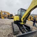 2024 Yanmar VIO35 mini excavator, rear three-quarter view