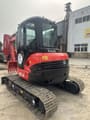 Kubota U55-4 crawler excavator, front three-quarter view