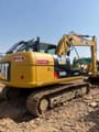 2023 Caterpillar 313D2 crawler excavator, rear three-quarter view