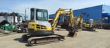 2006 New Holland E50.2C mini excavator, rear three-quarter view