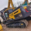 2024 Volvo EC210D crawler excavator, rear three-quarter view