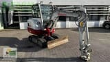 2018 Takeuchi TB230 V3 mini excavator, front three-quarter view
