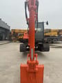 2018 Doosan DX60 crawler excavator, front view of boom and bucket