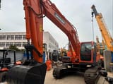 2022 Doosan DX225LC crawler excavator, front three-quarter view