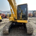 2014 Komatsu PC120-8 crawler excavator, front view of cab and boom