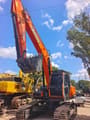 2024 Doosan DX225LC crawler excavator, front three-quarter view
