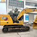 2022 Caterpillar 320GC crawler excavator side view