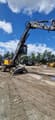 2018 Volvo EW240EMH material handler, side view