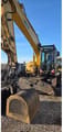 2006 Caterpillar M318CMH wheel excavator front view