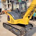 Komatsu PC55MR-2 mini excavator, rear three-quarter view