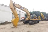 2012 Caterpillar 330BL crawler excavator, front three-quarter view