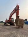 2023 Doosan DX380LC-9C excavator, front three-quarter view