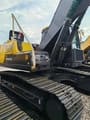 2022 Volvo EC210 crawler excavator, rear three-quarter view