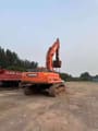 2023 Doosan DX380LC-9C excavator, rear view