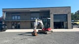2018 Takeuchi TB23R mini excavator, front three-quarter view