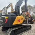 2022 Volvo EC140 crawler excavator, rear three-quarter view